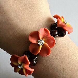 Plumeria bracelet floral flower orange red pink brown wood island girl